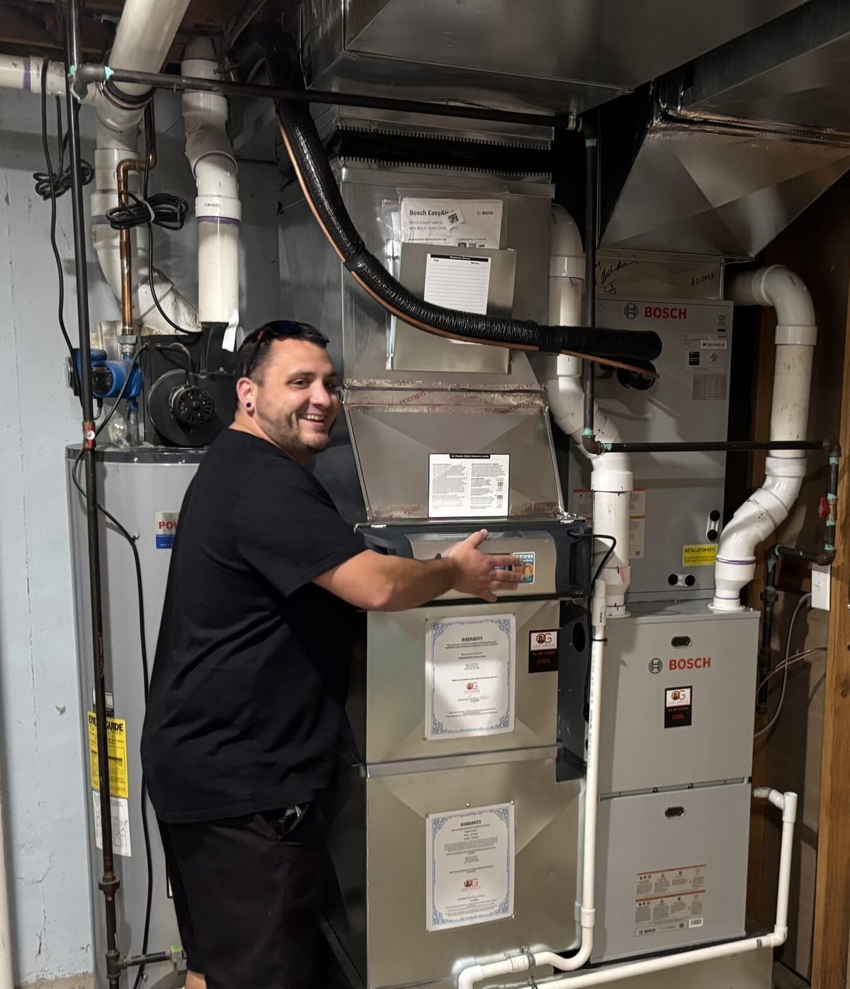 An Oak Grove technician installing ductwork