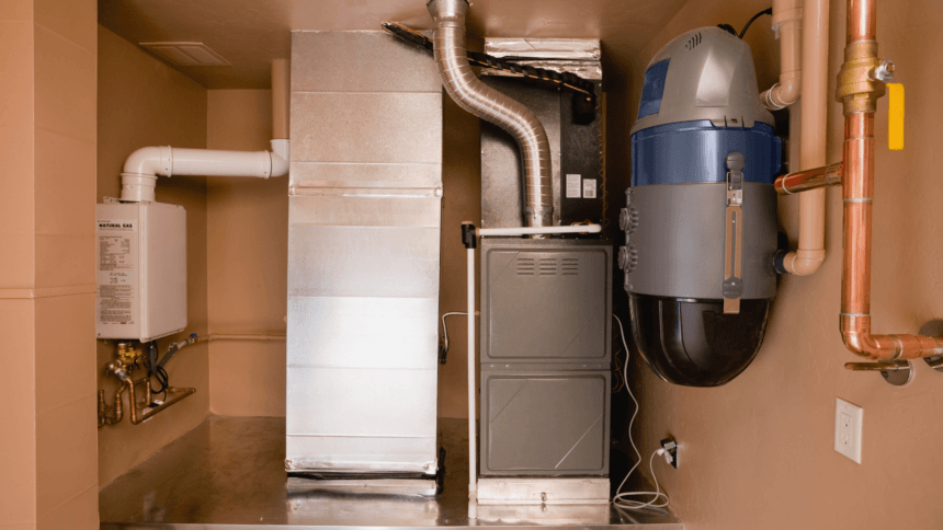 Newly installed residential gas furnace system with ductwork and ventilation setup in a mechanical room.